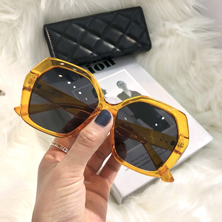 Venta al por mayor, gafas de sol transparentes para mujer con marco grande y personalidad